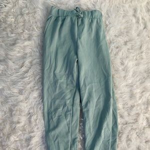 Green sweatpants